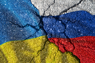 Ukraine and Russia flag with cracks, political conflict GettyImages-1372349037